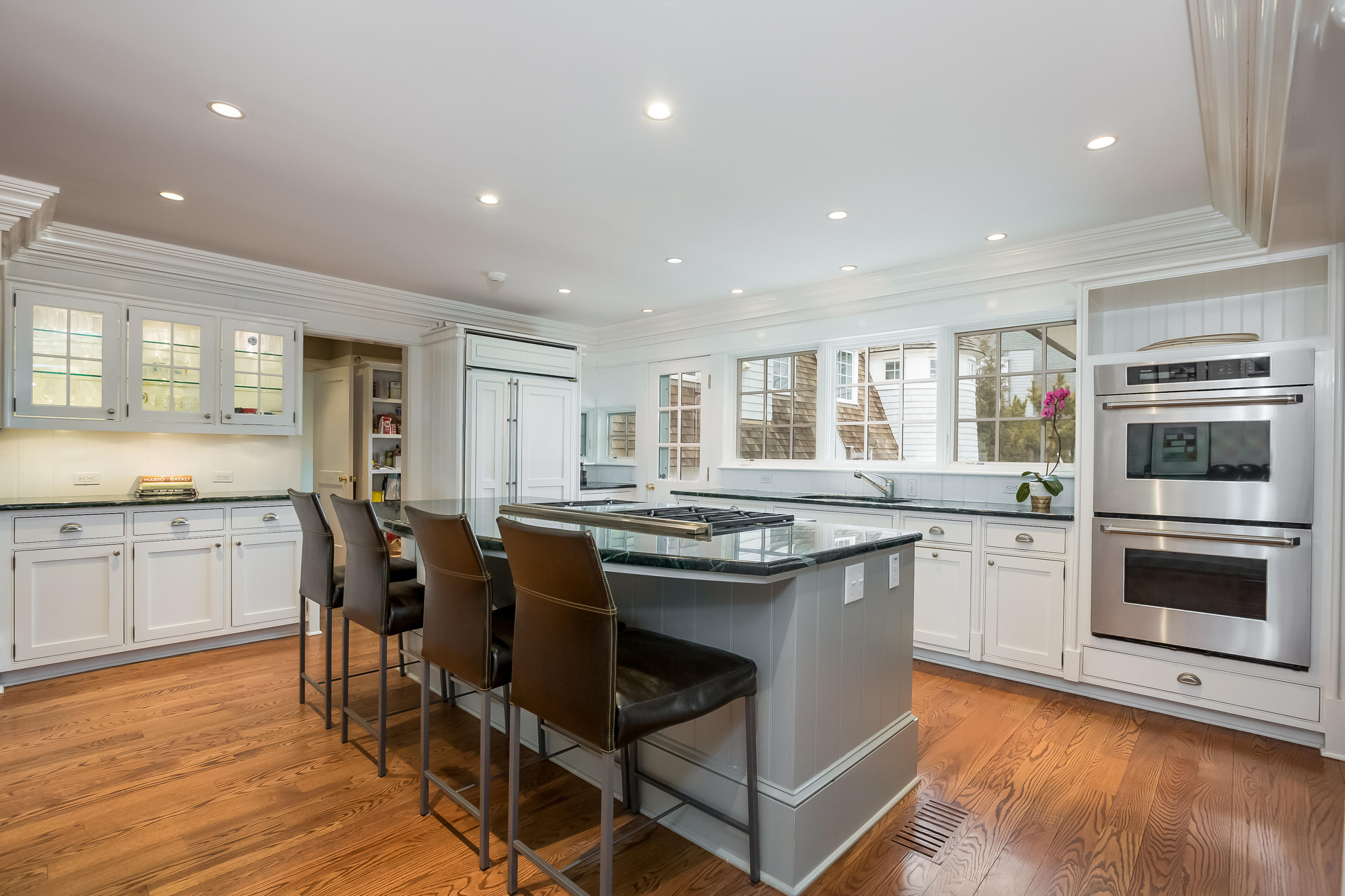 13 Crescent Beach Road Rowayton, CT 06853 - Photo 15 of 40 a kitchen with stainless steel appliances granite countertop a stove and a sink