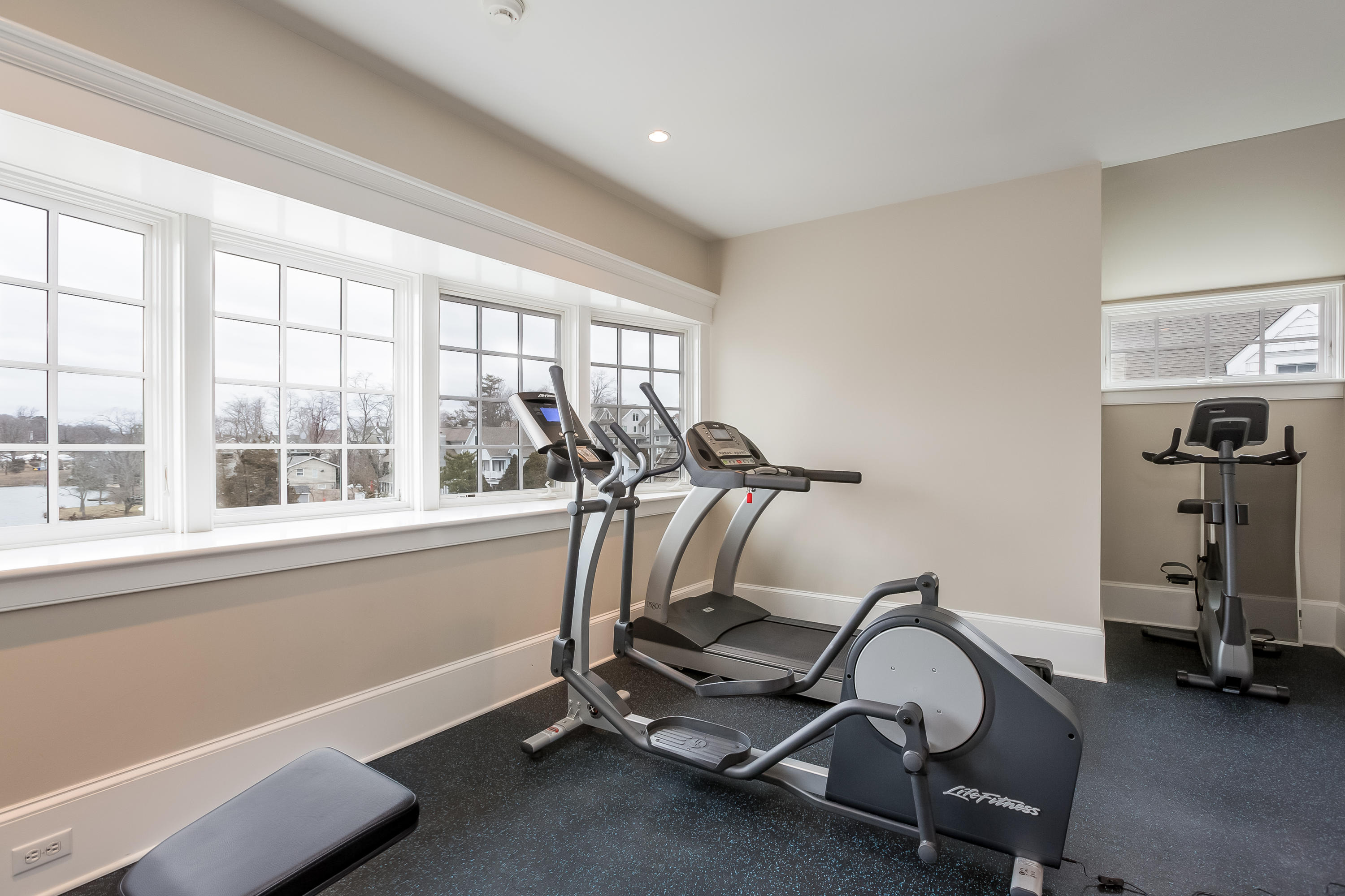 13 Crescent Beach Road Rowayton, CT 06853 - Photo 32 of 40 a view of a room with gym equipment
