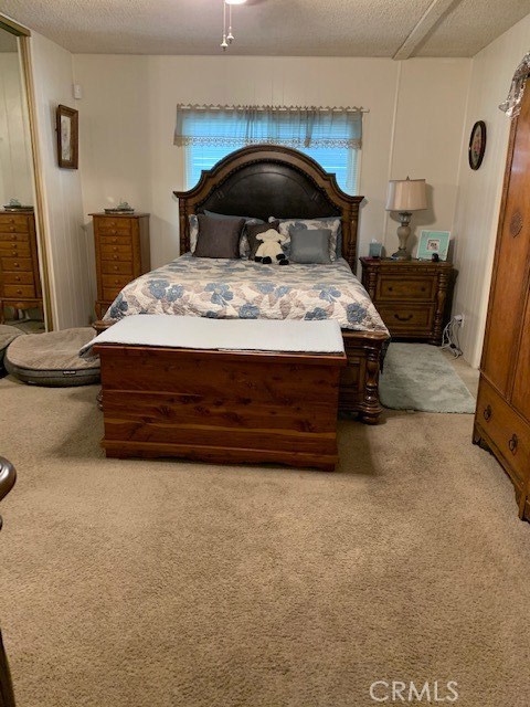 4401 Camelot Place Bakersfield, CA 93301 - Photo 11 of 37 a bed sitting in a bedroom next to a window