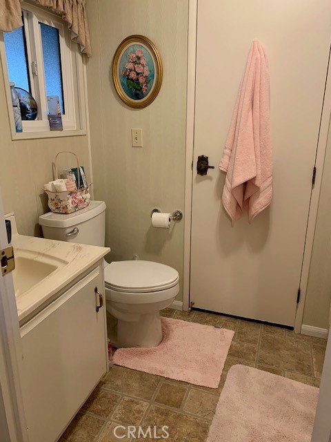 4401 Camelot Place Bakersfield, CA 93301 - Photo 12 of 37 a bathroom with a toilet and a shower