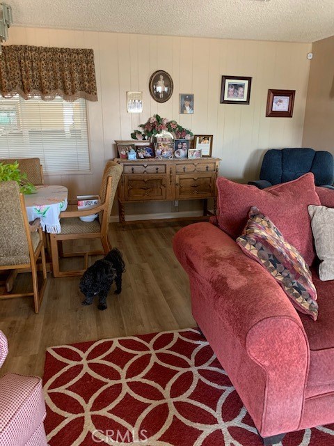 4401 Camelot Place Bakersfield, CA 93301 - Photo 19 of 37 a living room with furniture and a lamp