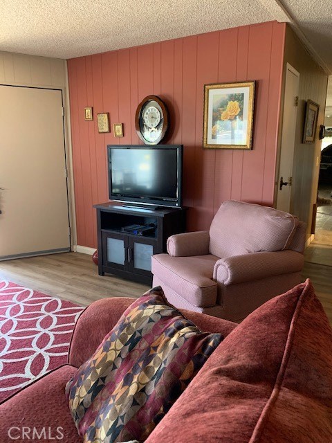 4401 Camelot Place Bakersfield, CA 93301 - Photo 20 of 37 a living room with furniture and a flat screen tv