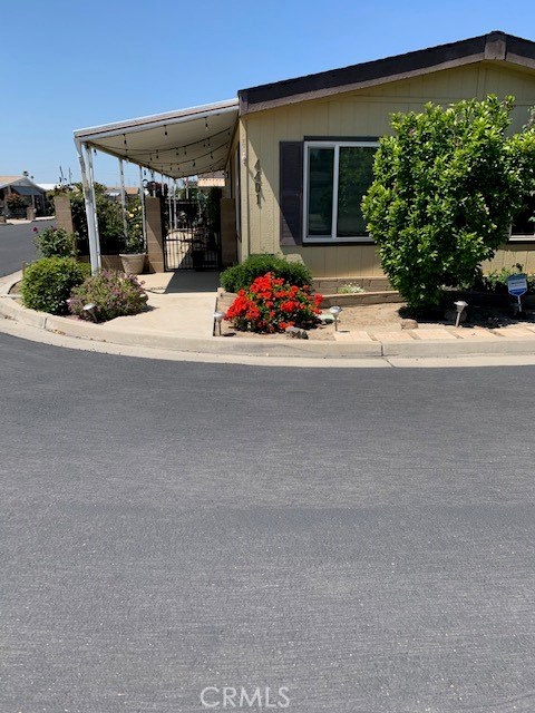 4401 Camelot Place Bakersfield, CA 93301 - Photo 2 of 37 a couple of cars parked in front of a building