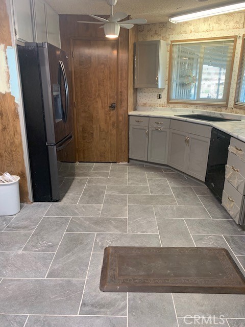 4401 Camelot Place Bakersfield, CA 93301 - Photo 26 of 37 a bathroom with a sink and mirror