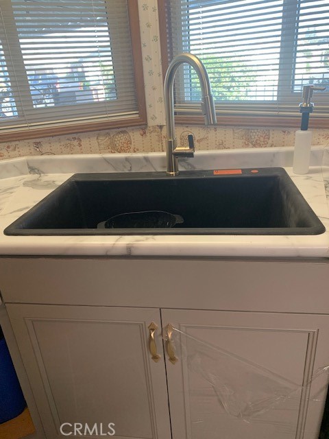 4401 Camelot Place Bakersfield, CA 93301 - Photo 27 of 37 a close view of sink and tap