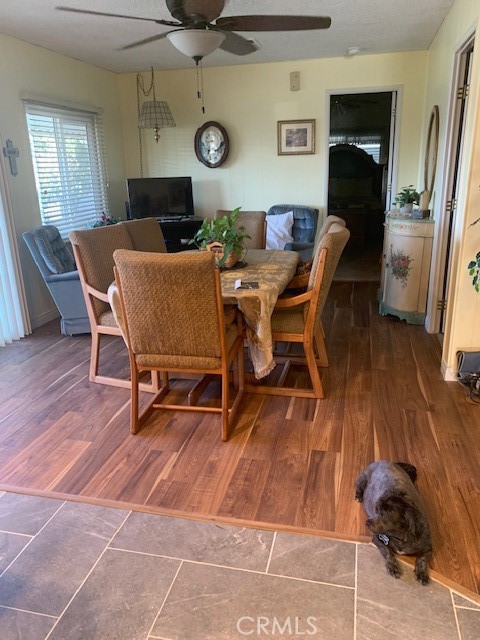 4401 Camelot Place Bakersfield, CA 93301 - Photo 34 of 37 a dining room with furniture and wooden floor
