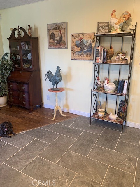 4401 Camelot Place Bakersfield, CA 93301 - Photo 36 of 37 a room with gym equipment and a table