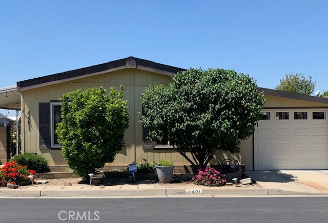 4401 Camelot Place Bakersfield, CA 93301 - Photo 7 of 37 front view of a house with a street