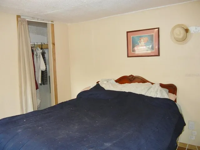 a room with furniture and wooden floor