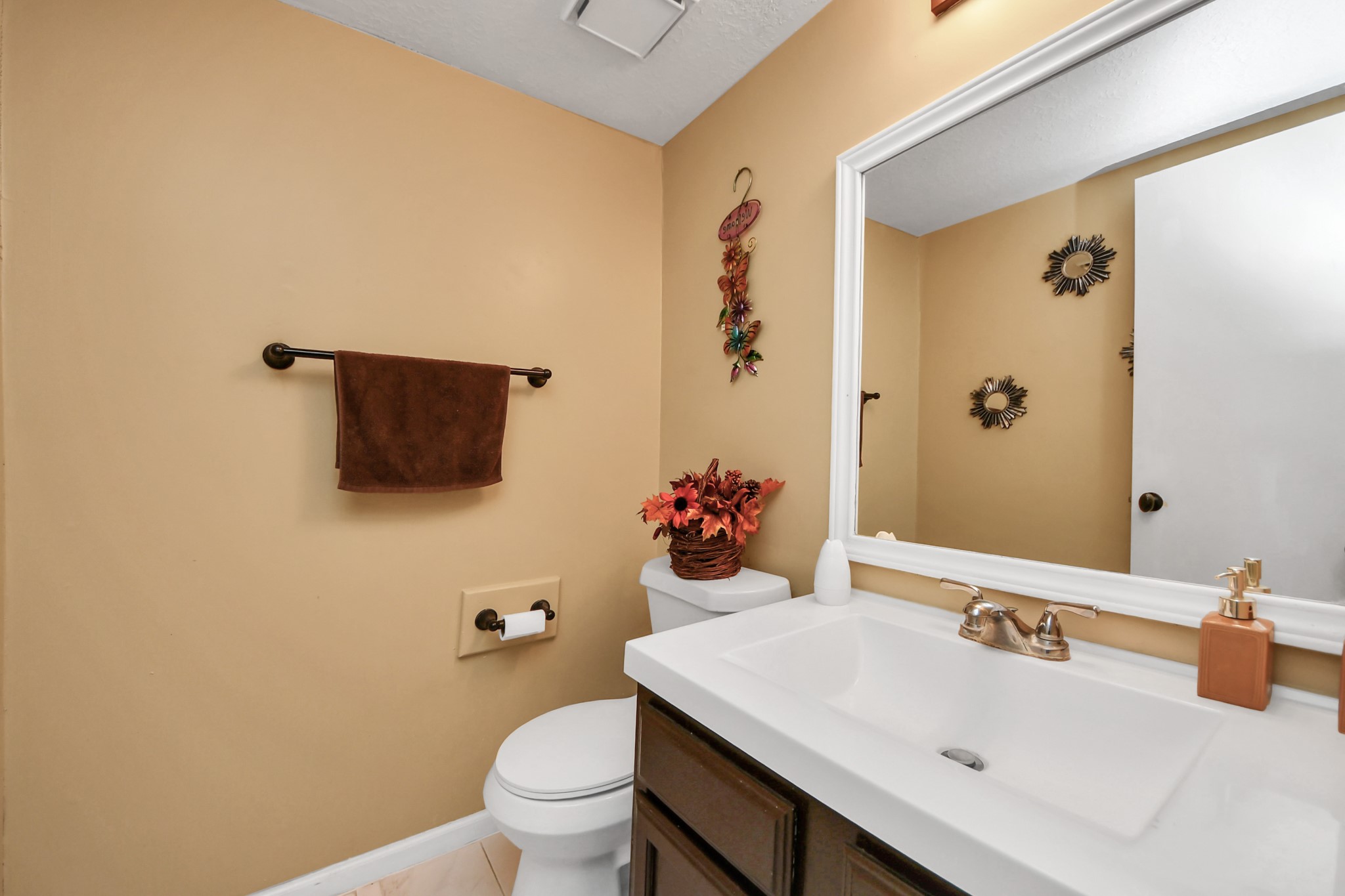 13620 Rosewood Street, Unit 3A Houston, TX 77083 - Photo 17 of 25 a bathroom with a sink and a mirror