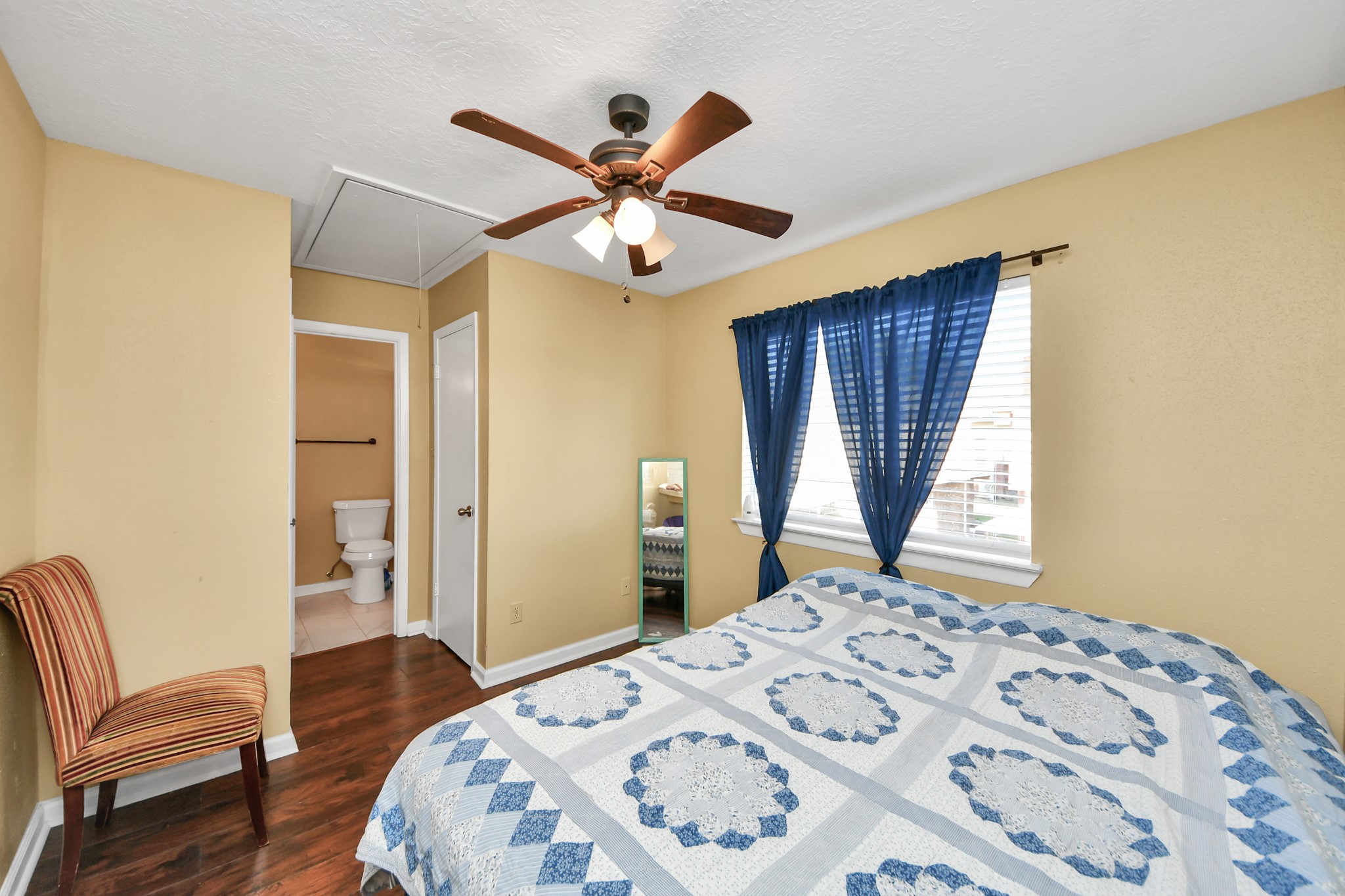 13620 Rosewood Street, Unit 3A Houston, TX 77083 - Photo 19 of 25 a bedroom with a bed and a window