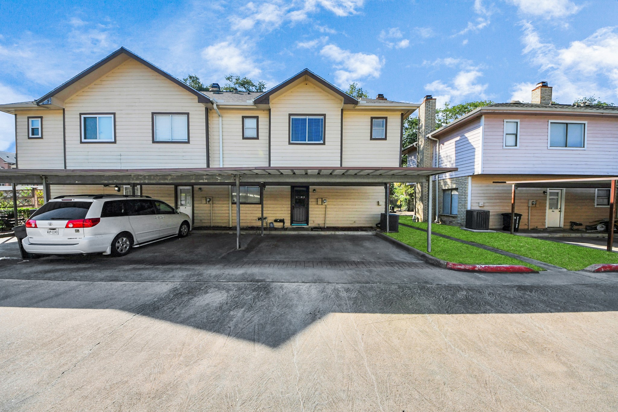 13620 Rosewood Street, Unit 3A Houston, TX 77083 - Photo 23 of 25 a view of multiple houses with a yard