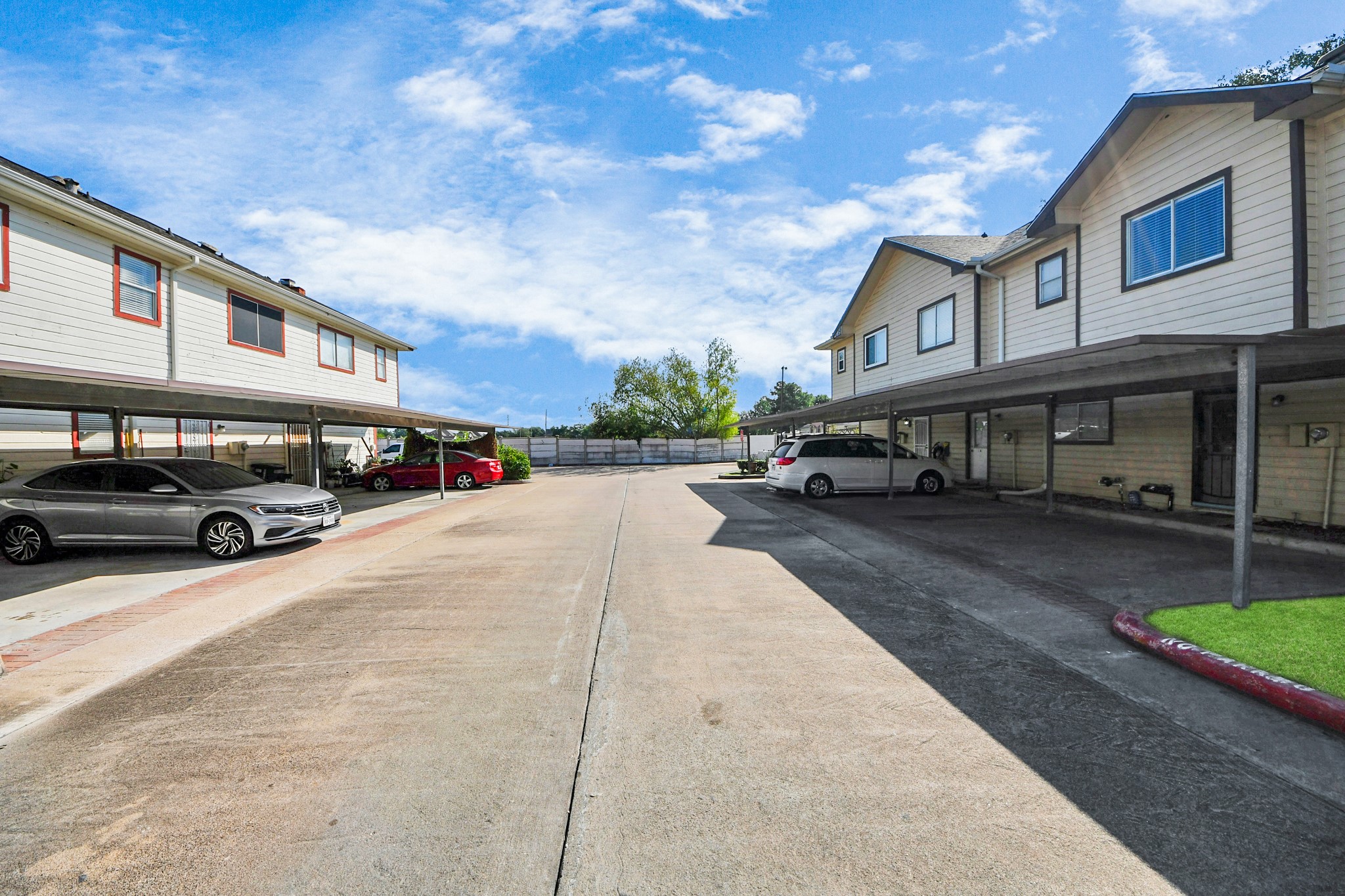 13620 Rosewood Street, Unit 3A Houston, TX 77083 - Photo 25 of 25 a street with cars parked in front of it