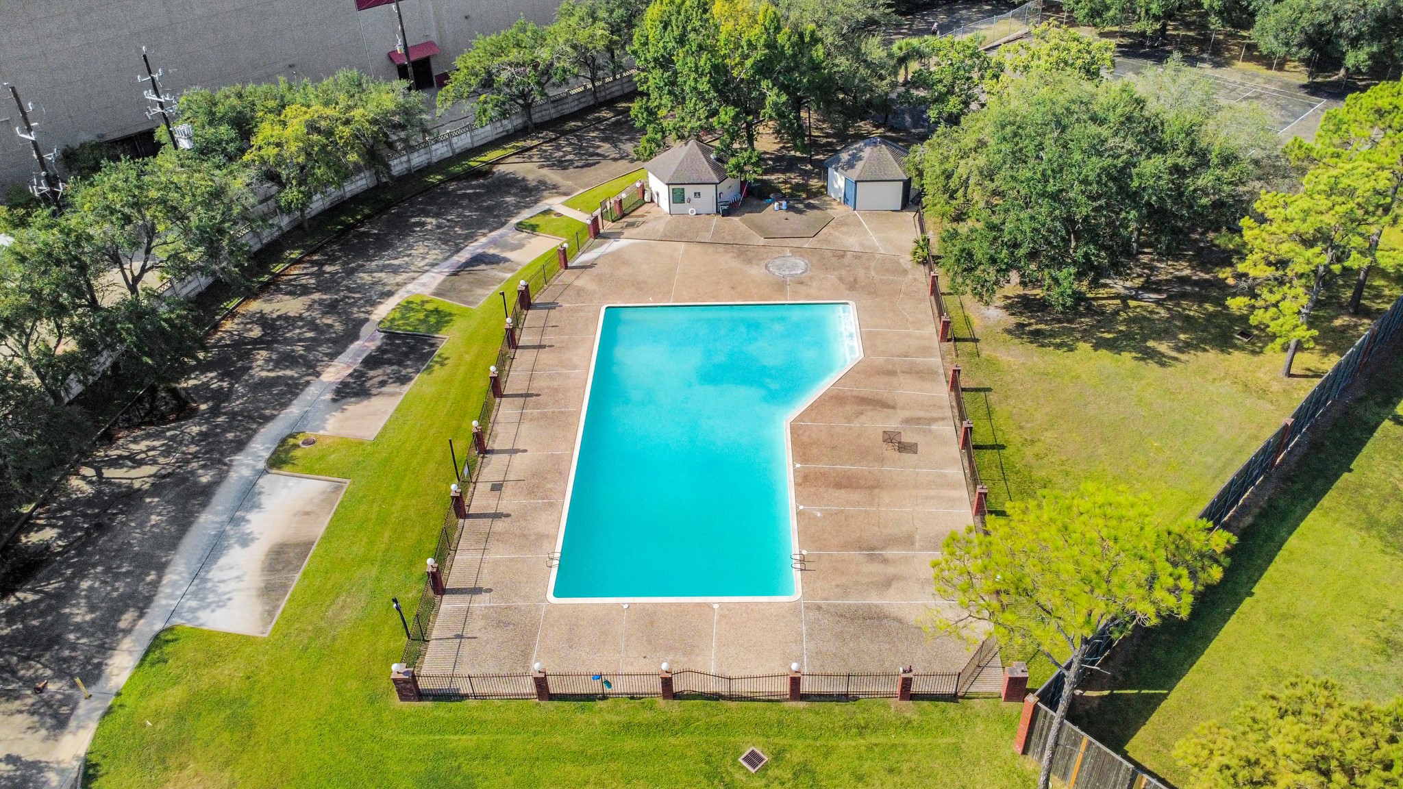 13620 Rosewood Street, Unit 3A Houston, TX 77083 - Photo 5 of 25 an aerial view of a house with swimming pool