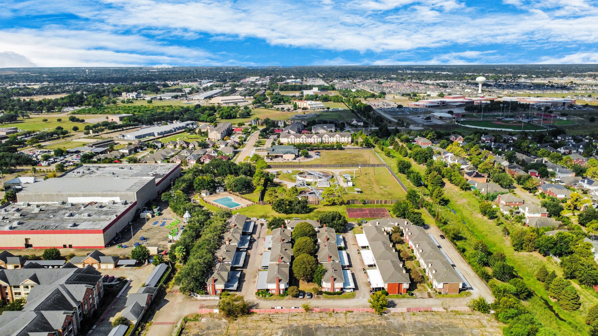 13620 Rosewood Street, Unit 3A Houston, TX 77083 - Photo 6 of 25 an aerial view of residential building with parking space