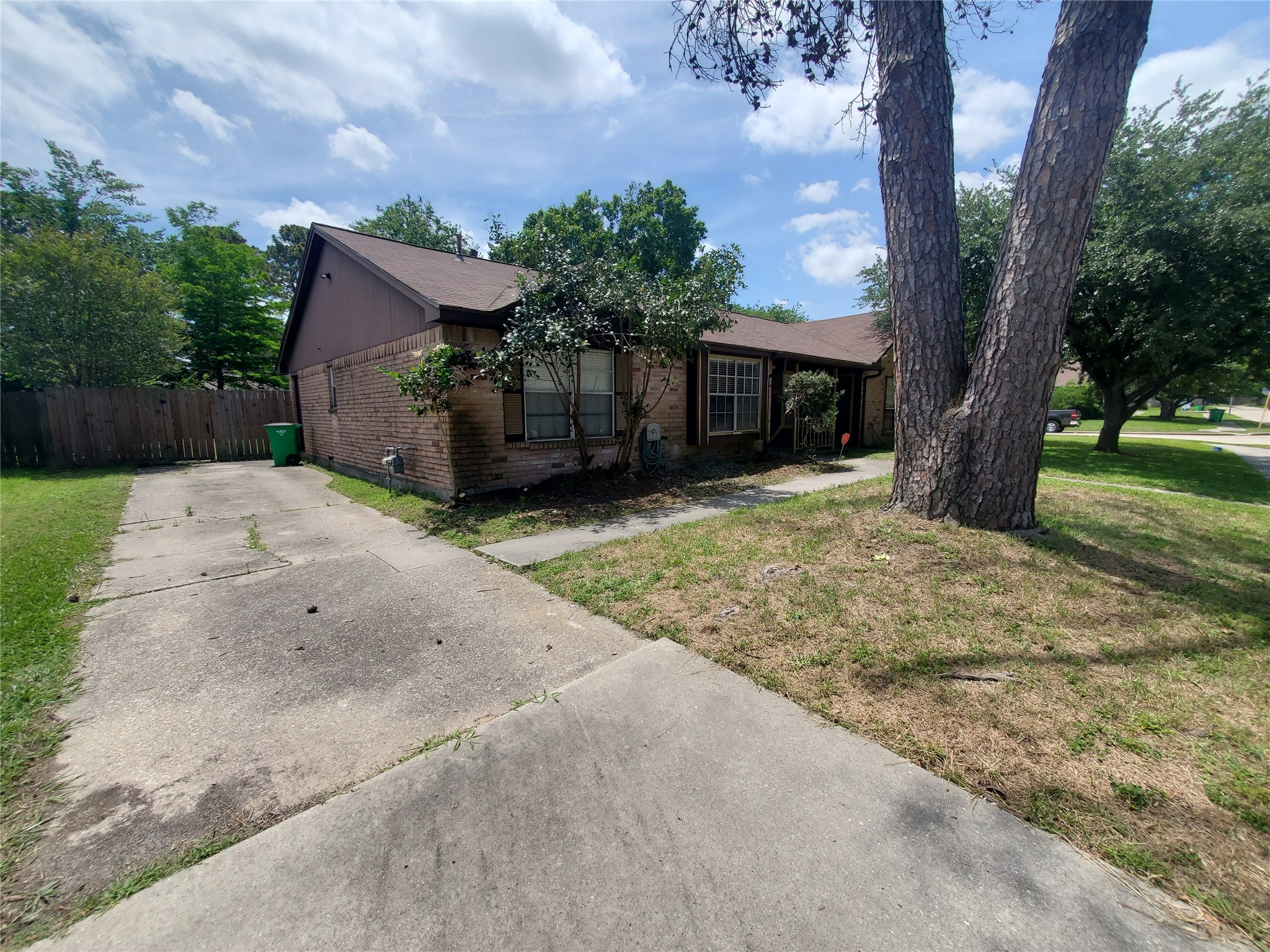 2306 Spring Dusk Drive Spring, TX 77373 - Photo 3 of 12 a front view of a house with a yard and garage
