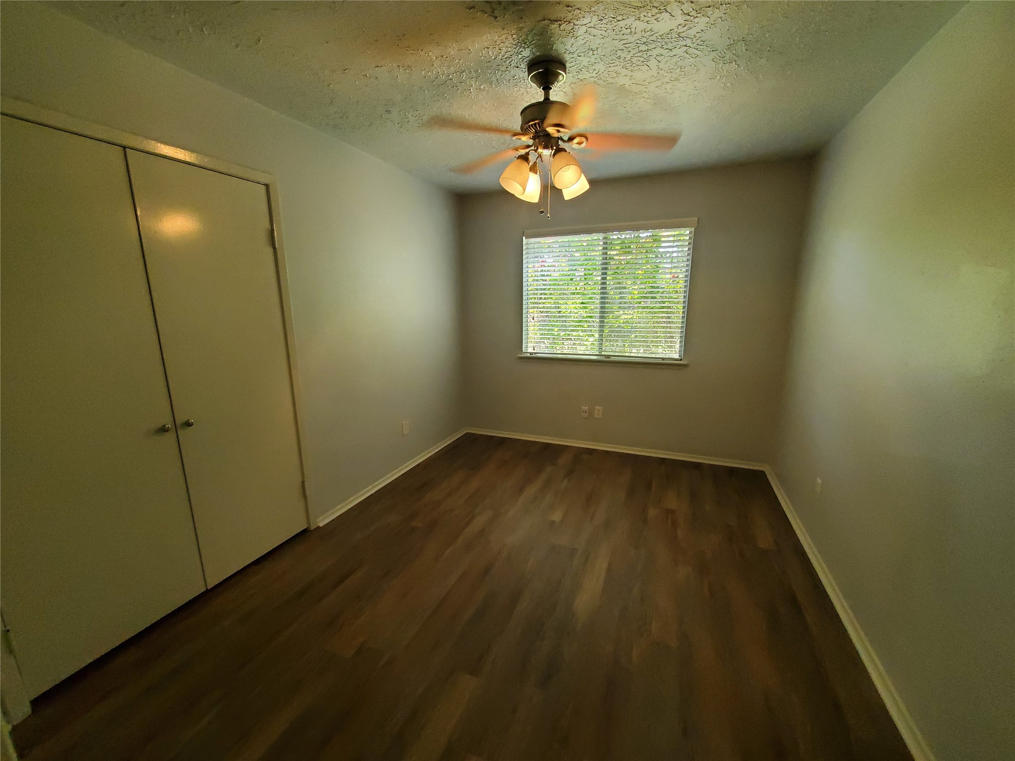 2306 Spring Dusk Drive Spring, TX 77373 - Photo 9 of 12 a view of an empty room and chandelier fan