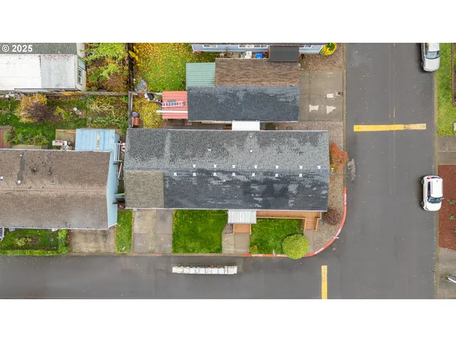 a picture of a building with a garden
