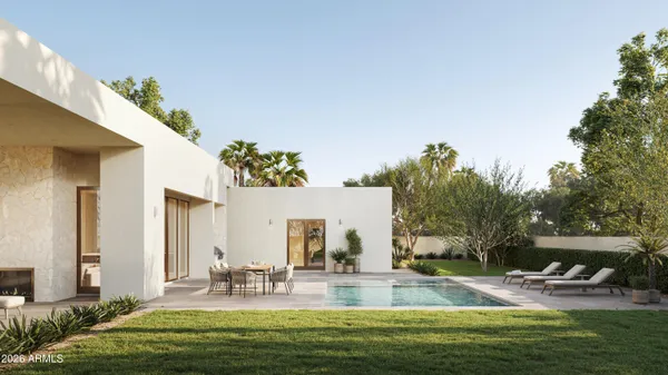 a view of a swimming pool with a patio