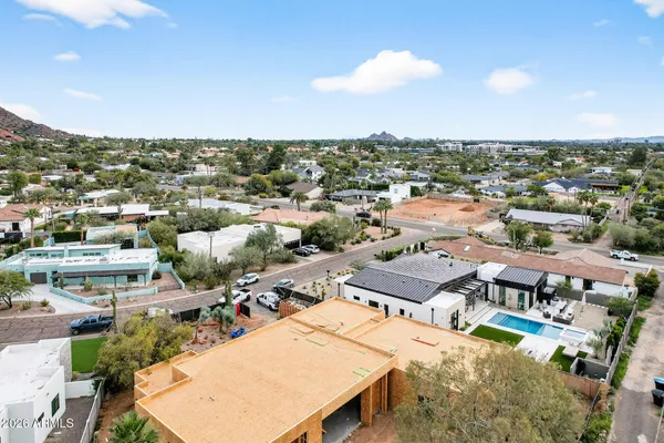 an aerial view of a city with lots of residential buildings