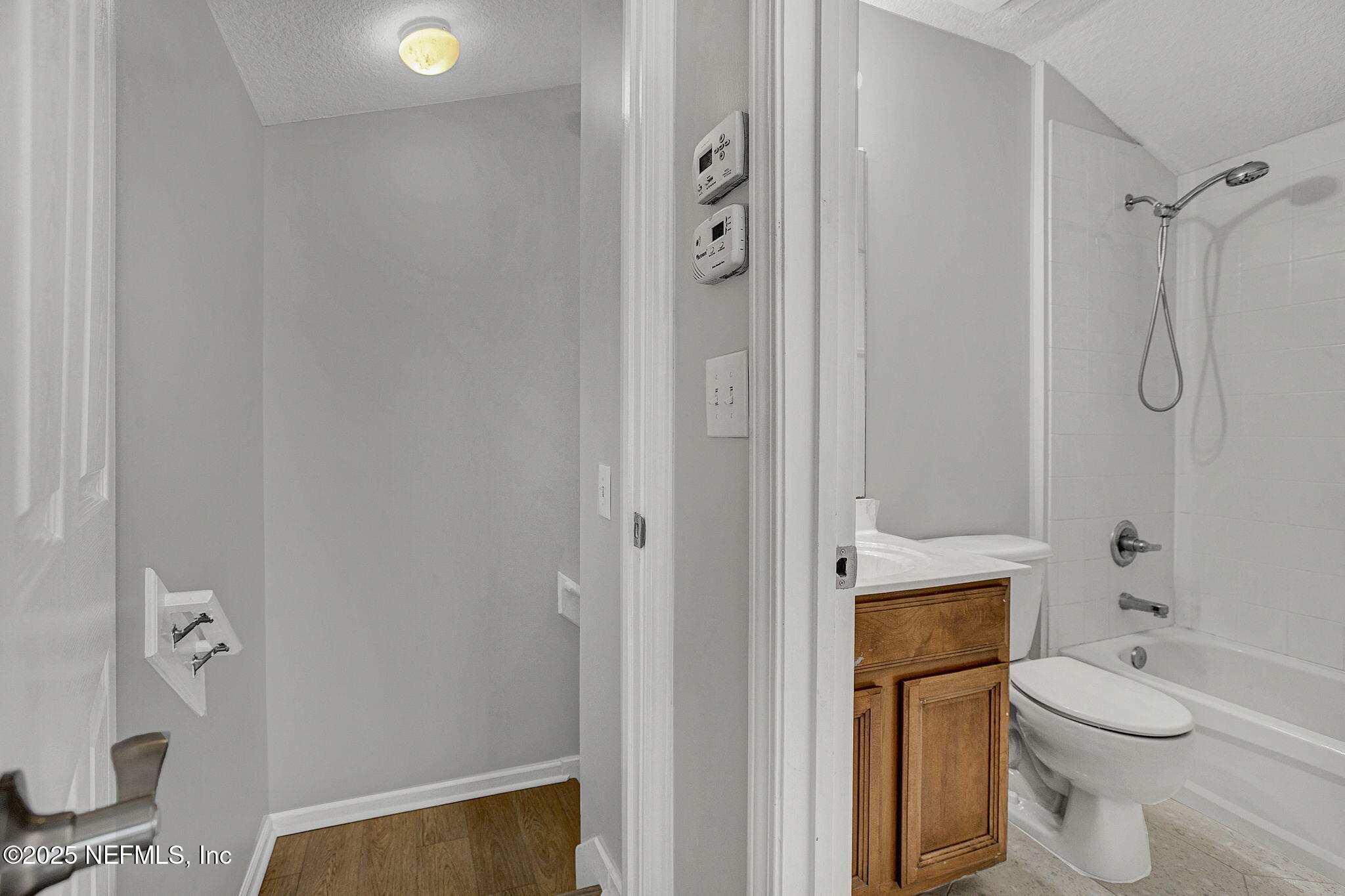 939 Silver Spring Court St. Augustine, FL 32092 - Photo 17 of 31 a bathroom with a toilet and a shower