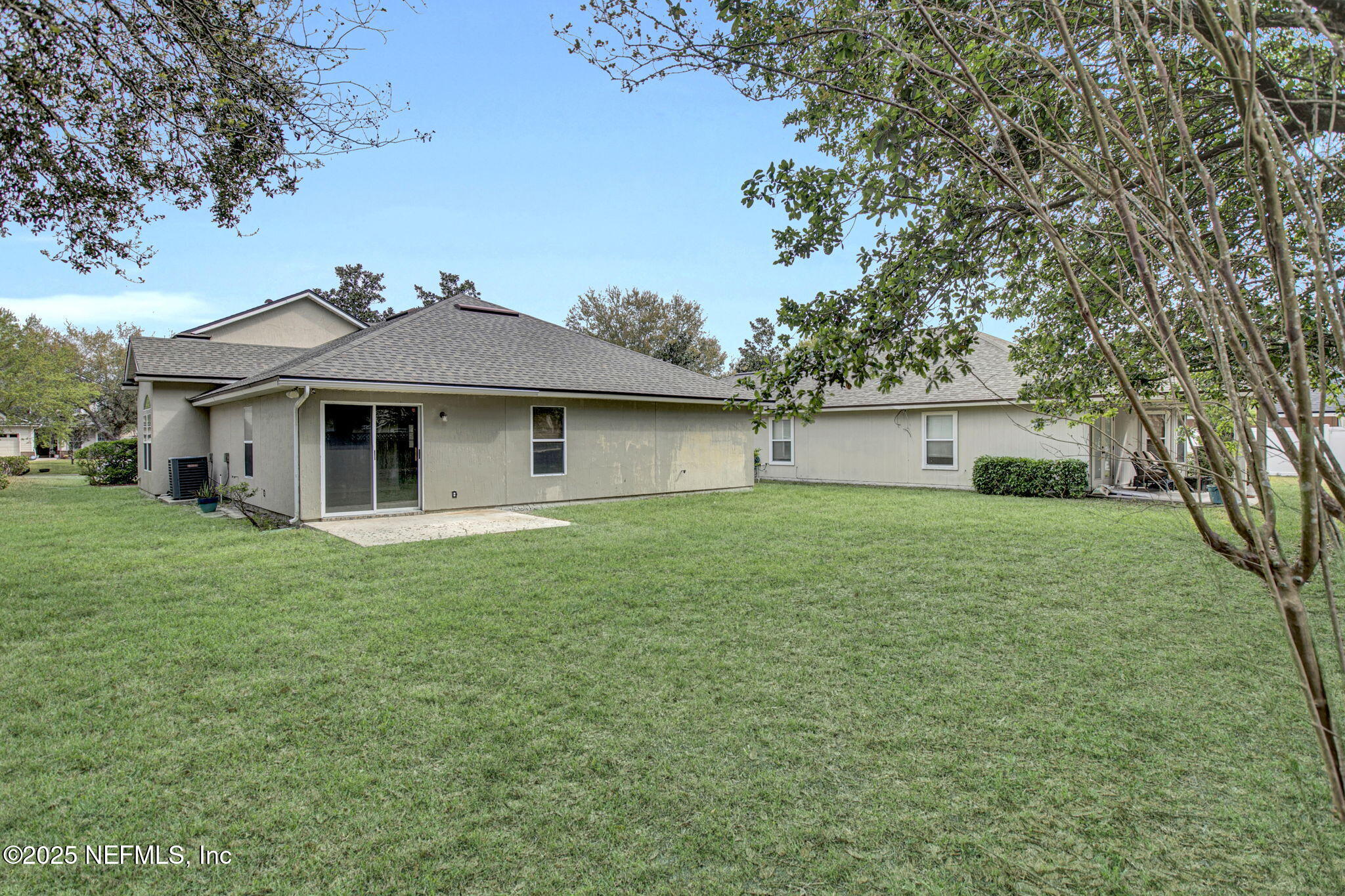 939 Silver Spring Court St. Augustine, FL 32092 - Photo 31 of 31 a front view of a house with a garden