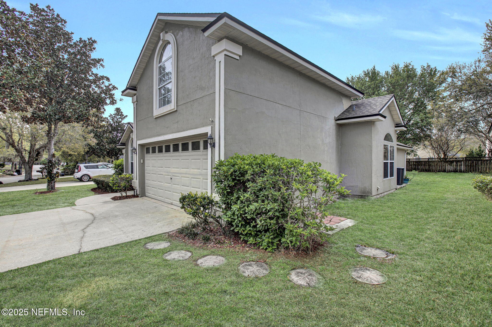 939 Silver Spring Court St. Augustine, FL 32092 - Photo 4 of 31 a front view of a house with garden