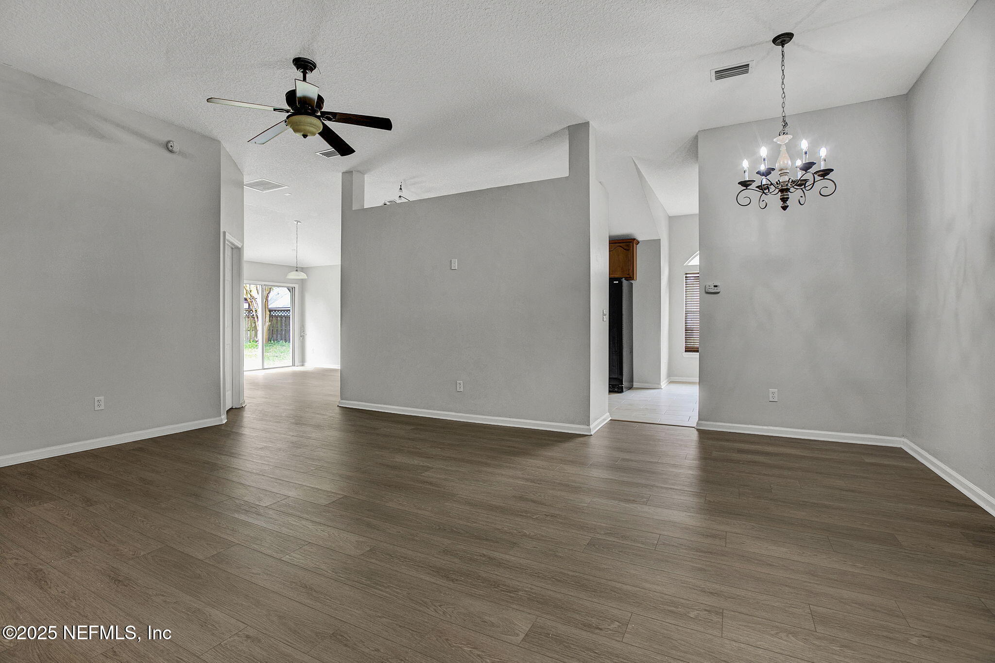 939 Silver Spring Court St. Augustine, FL 32092 - Photo 7 of 31 a view of a livingroom with a chandelier