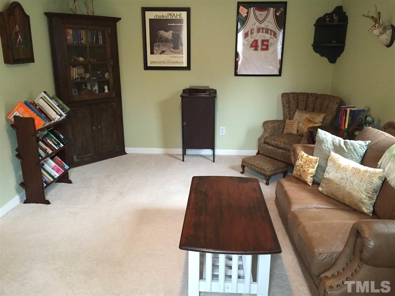 2360 Declaration Drive Raleigh, NC 27615 - Photo 13 of 22 a living room with furniture and a lamp