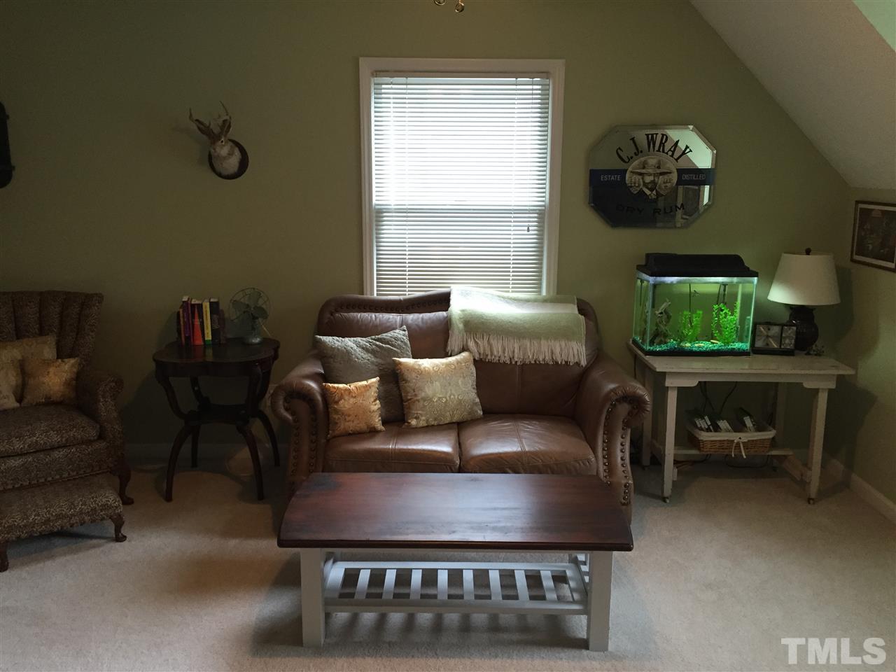 2360 Declaration Drive Raleigh, NC 27615 - Photo 14 of 22 a living room with furniture and a window