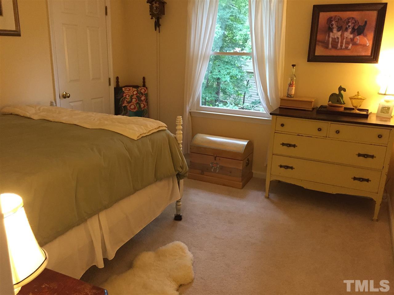 2360 Declaration Drive Raleigh, NC 27615 - Photo 16 of 22 a bedroom with a bed and a window
