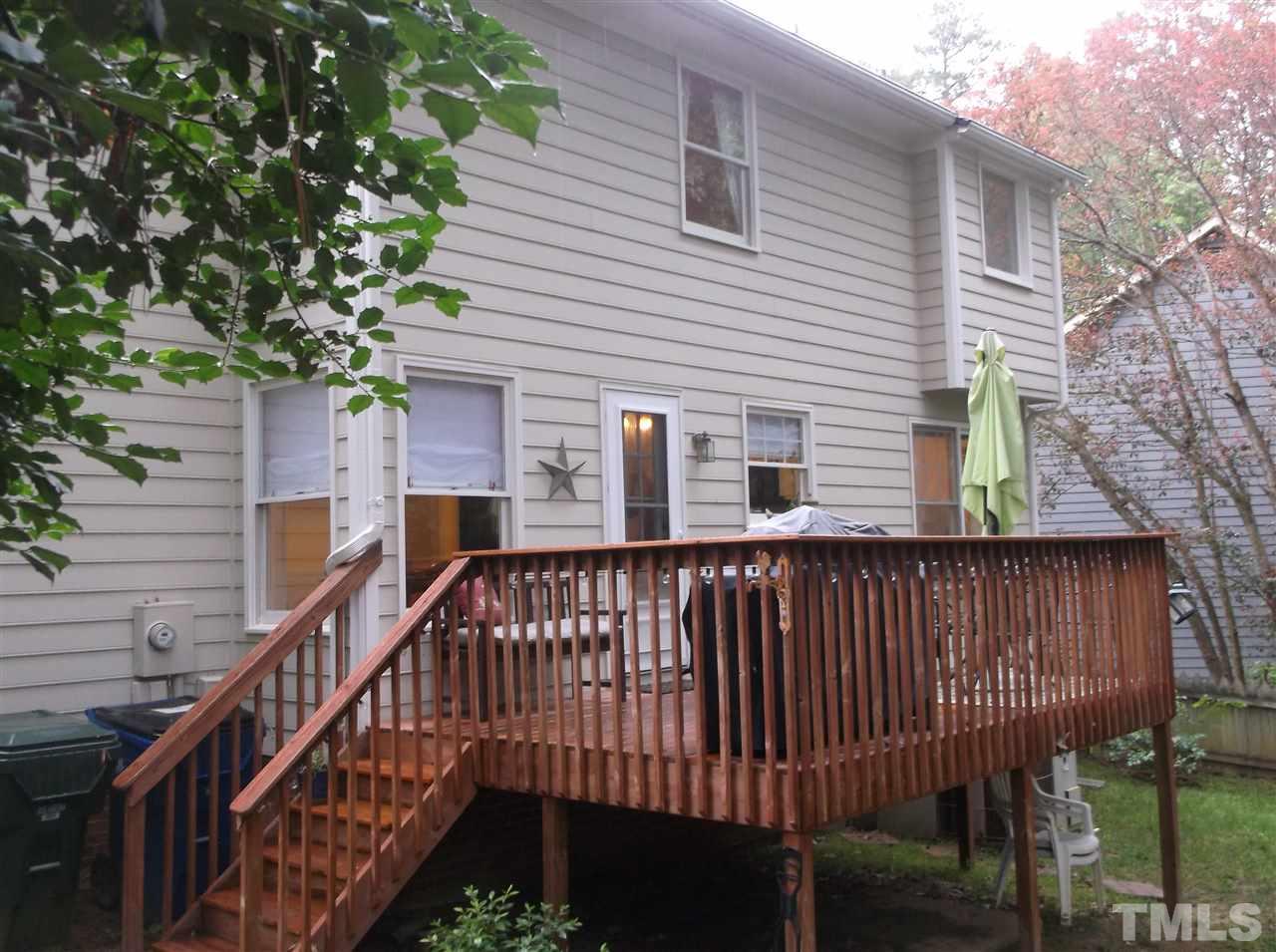 2360 Declaration Drive Raleigh, NC 27615 - Photo 21 of 22 a view of a house with wooden deck and furniture