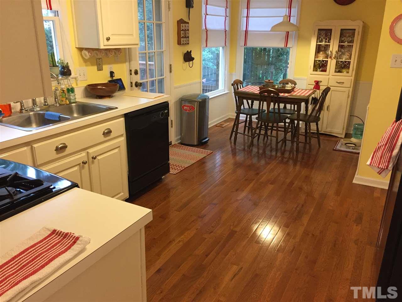2360 Declaration Drive Raleigh, NC 27615 - Photo 4 of 22 a kitchen with stove and cabinets