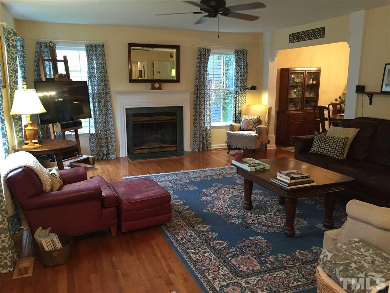 2360 Declaration Drive Raleigh, NC 27615 - Photo 6 of 22 a living room with furniture and a fireplace