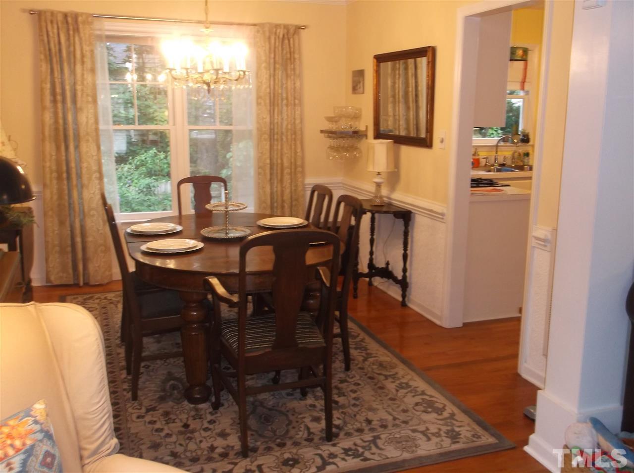 2360 Declaration Drive Raleigh, NC 27615 - Photo 8 of 22 a view of a dining room with furniture window and wooden floor