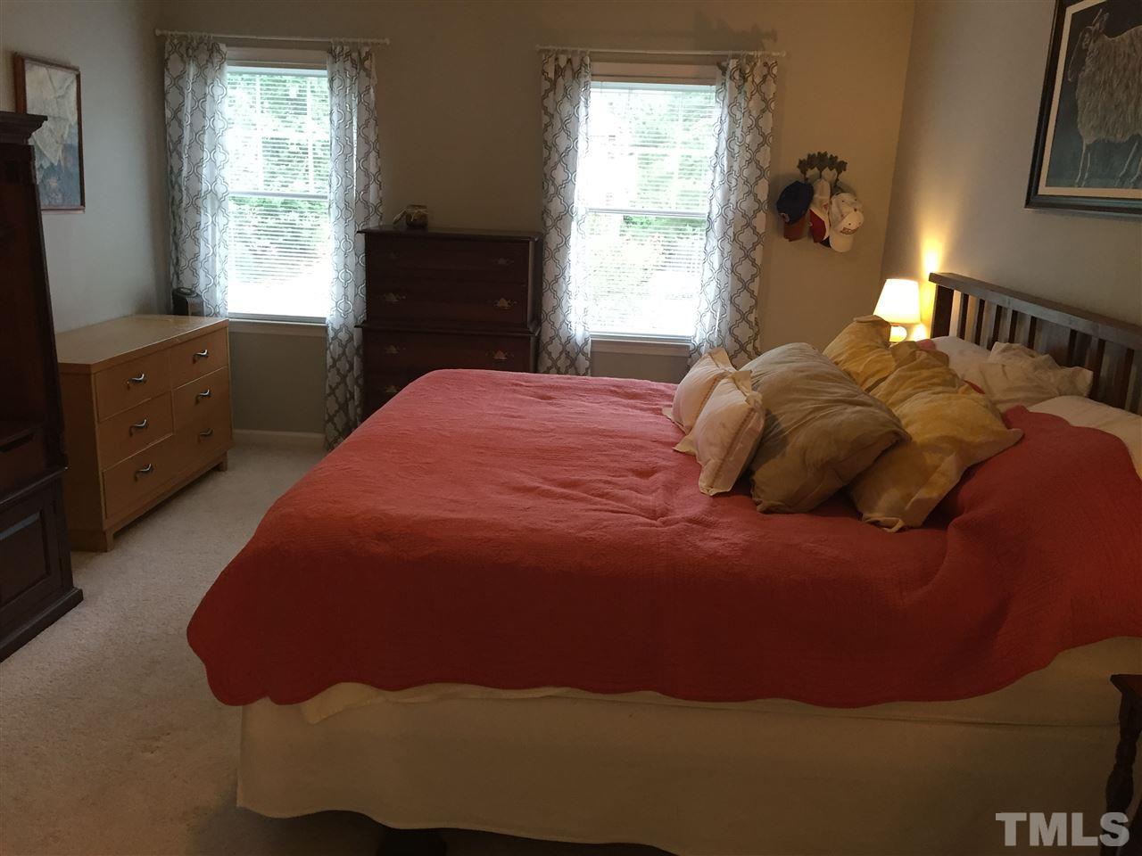 2360 Declaration Drive Raleigh, NC 27615 - Photo 10 of 22 a bedroom with a bed and window
