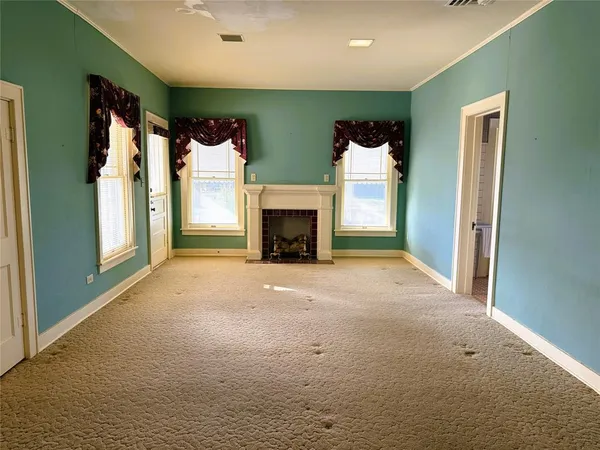a view of a livingroom with a fireplace