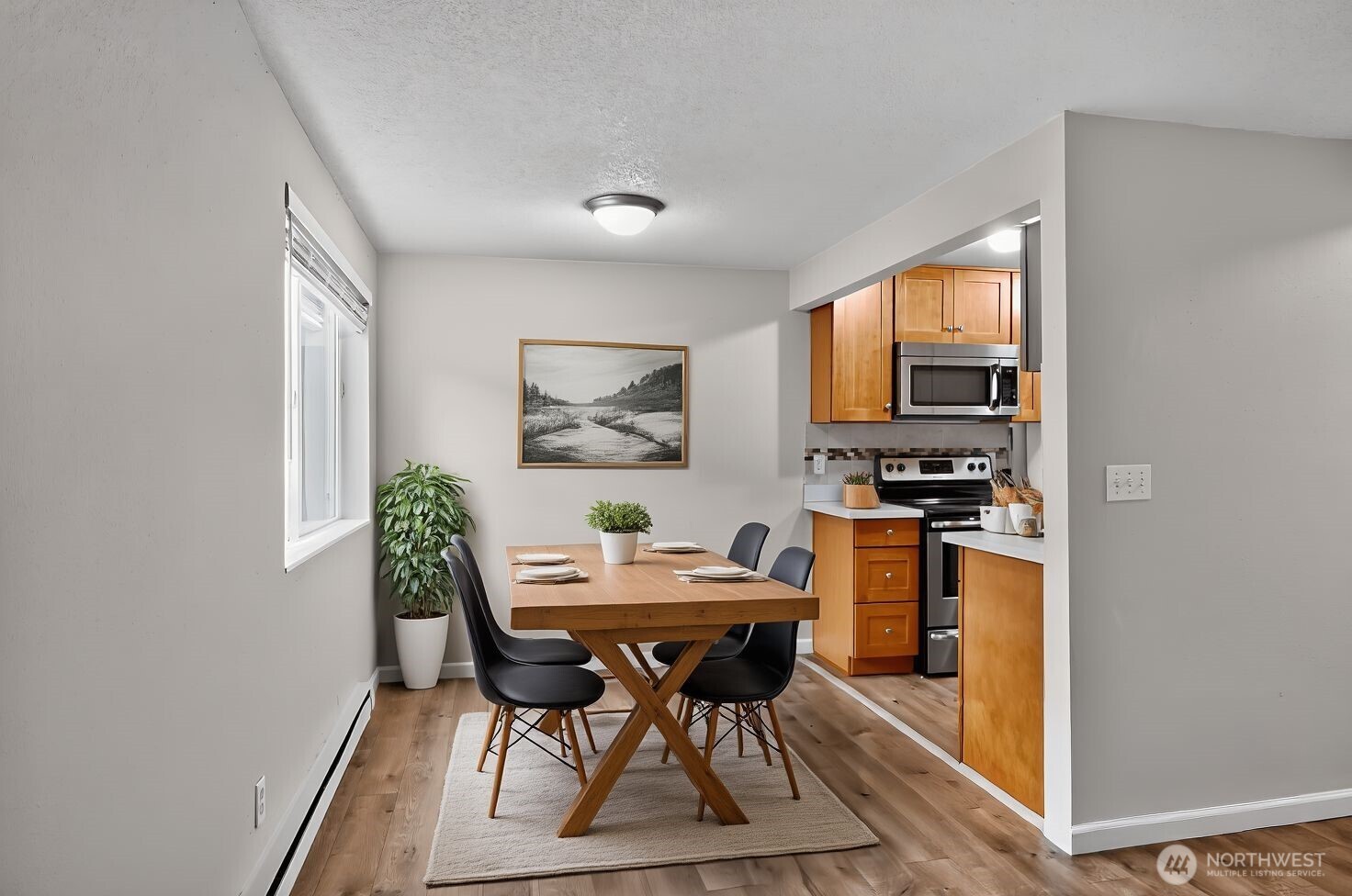 1601 Maple Lane, Unit B1 Kent, WA 98030 - Photo 2 of 20 a view of a dining room with furniture and a window