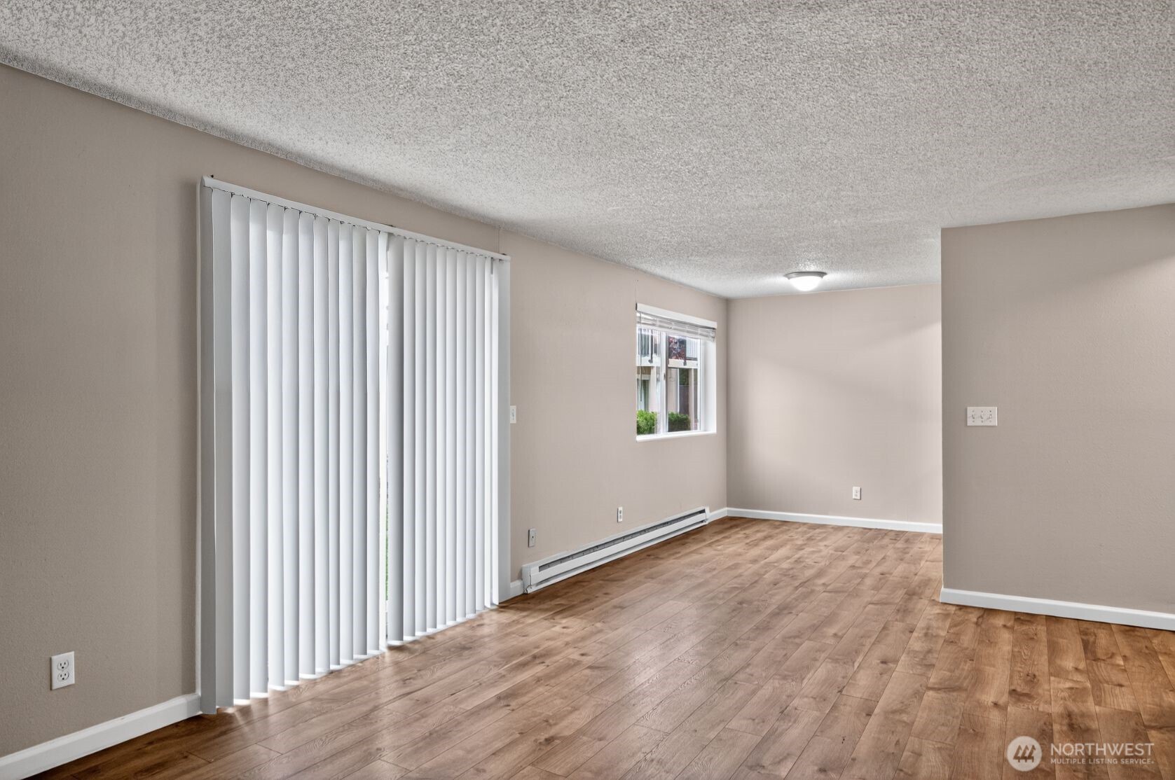 1601 Maple Lane, Unit B1 Kent, WA 98030 - Photo 9 of 20 an empty room with windows