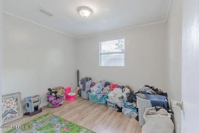 a bedroom with a bed and toys