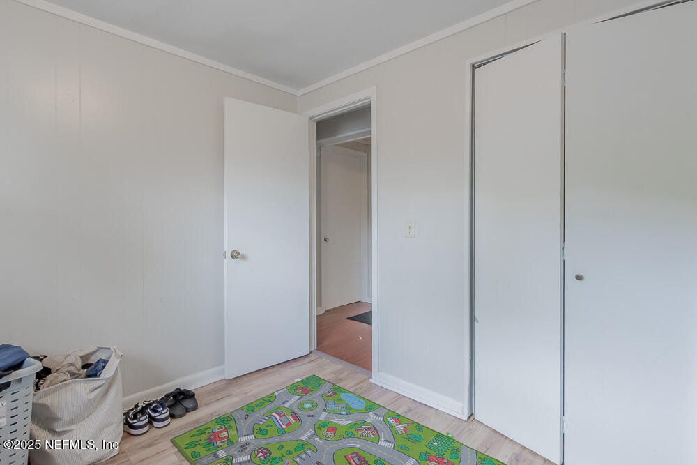 9042 7th Avenue Jacksonville, FL 32208 - Photo 15 of 22 a room with toys and a table