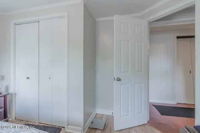 a view of room with hardwood floor