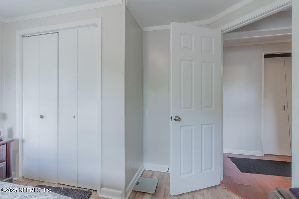 9042 7th Avenue Jacksonville, FL 32208 - Photo 17 of 22 a view of room with hardwood floor