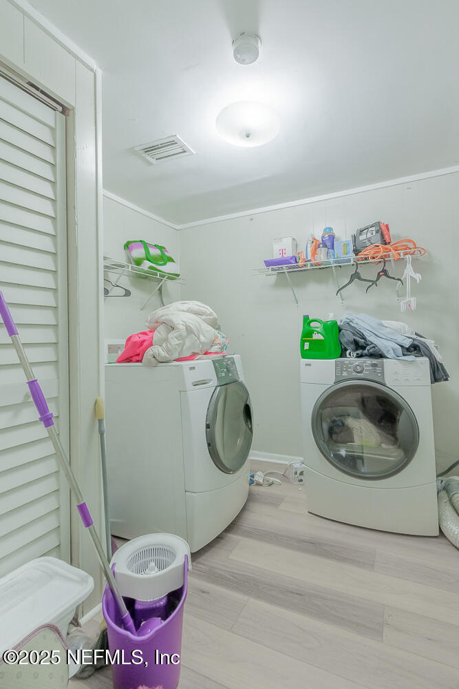 9042 7th Avenue Jacksonville, FL 32208 - Photo 22 of 22 a utility room with sink and toilet
