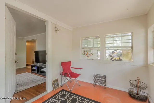 a room with furniture and a window