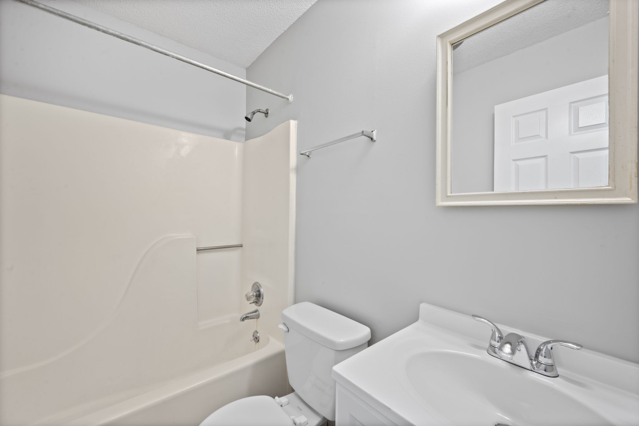 703 Power Street, Unit B Clarksville, TN 37042 - Photo 12 of 13 a bathroom with a sink toilet and shower