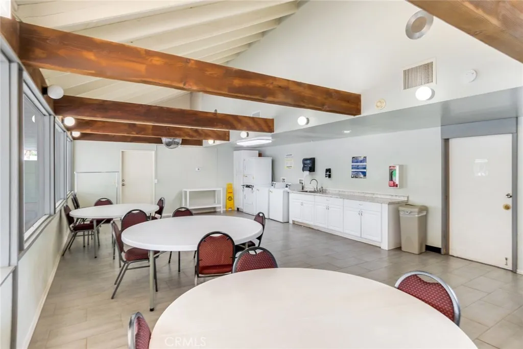 4000 Pierce Street, Unit 295 Riverside, CA 92501 - Photo 26 of 29 a very nice looking dining room with a table and chairs
