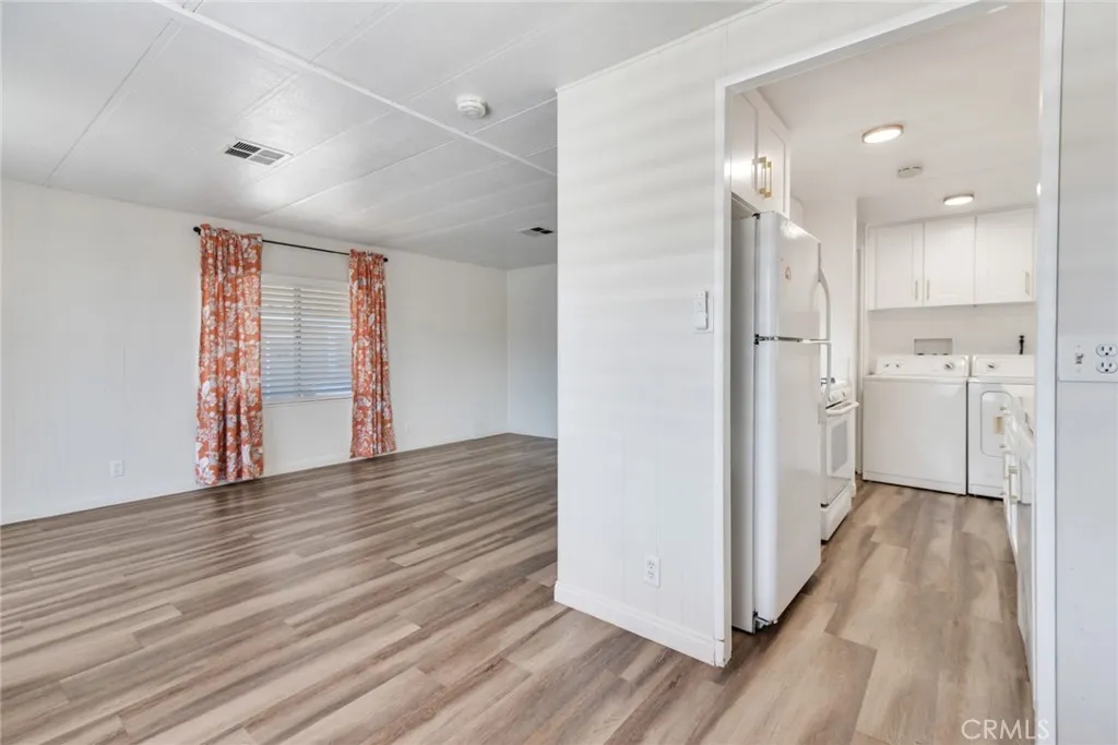 4000 Pierce Street, Unit 295 Riverside, CA 92501 - Photo 7 of 29 a view of a bathroom with wooden floor