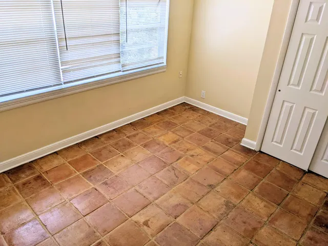 an empty room with windows