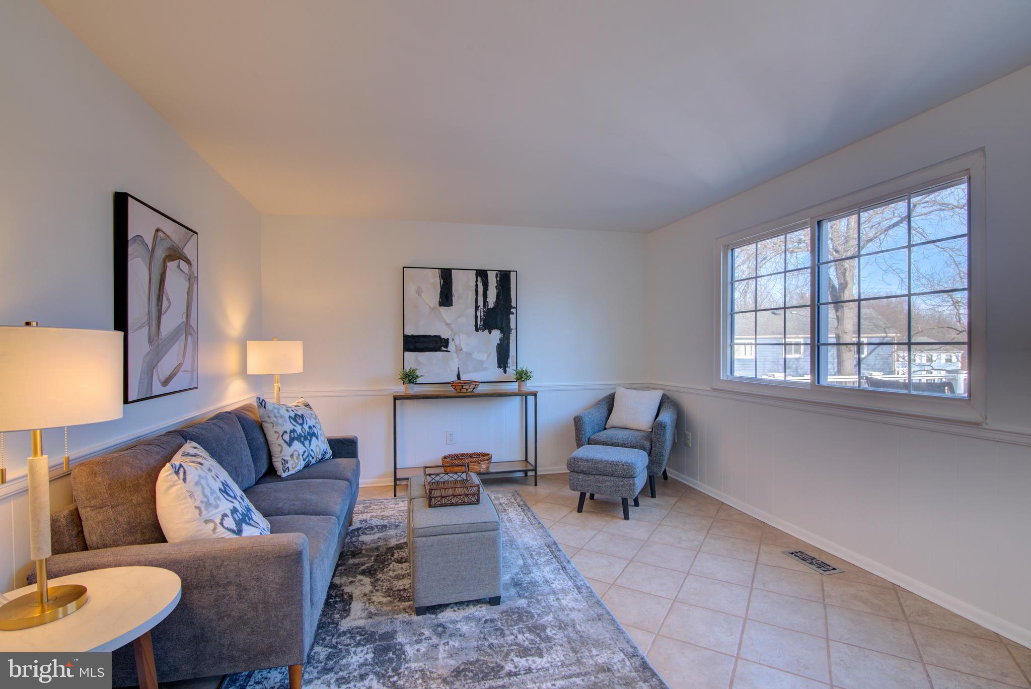 304 Aaron Court Sterling, VA 20164 - Photo 13 of 28 Wall of Windows with Door to Deck.